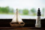 Miniature boat and lighthouse
